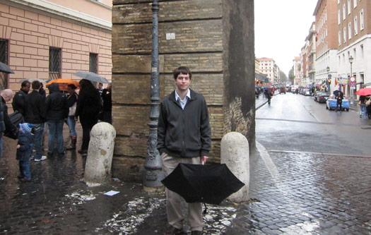Jeff Geerling standing on Sanpietrini pavers outside of St. Peter's square