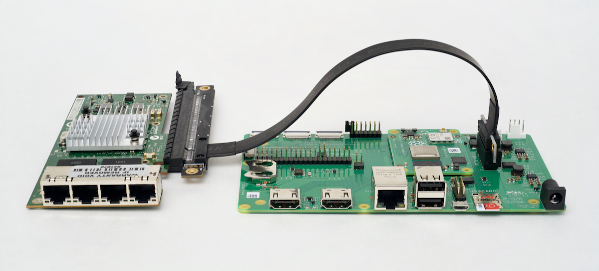 Intel I340-T4 plugged into Raspberry Pi Compute Module 4 IO Board with 16x to 1x adapter