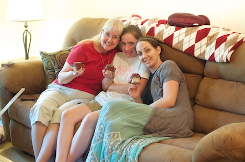 Sisters and Mom Holding Chai Bottles