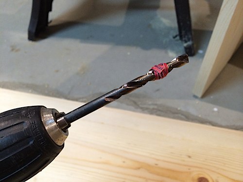 Drill using a twist tie as a stop
