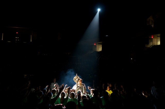 Wide photo with spotlight on monstrance at Steubenville St. Louis Mid-America 2013