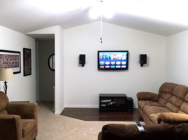Fireplace and brick chimney DIY removal picture - after with media wall