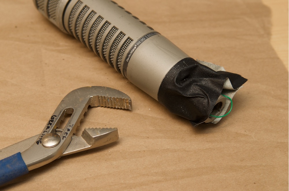 Electro-Voice RE20 remove base of mic with tape and plumber wrench