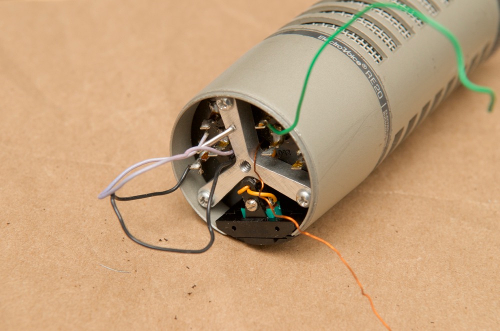 Electro-Voice RE20 tri-wing metal adapter screwed back in