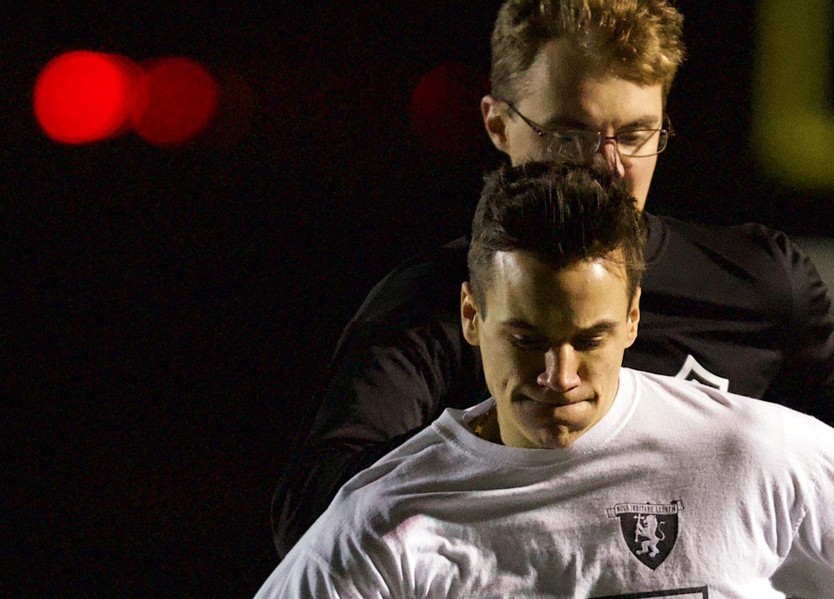 Tack sharp Nikon 300mm 2.8 soccer action photo - closeup detail