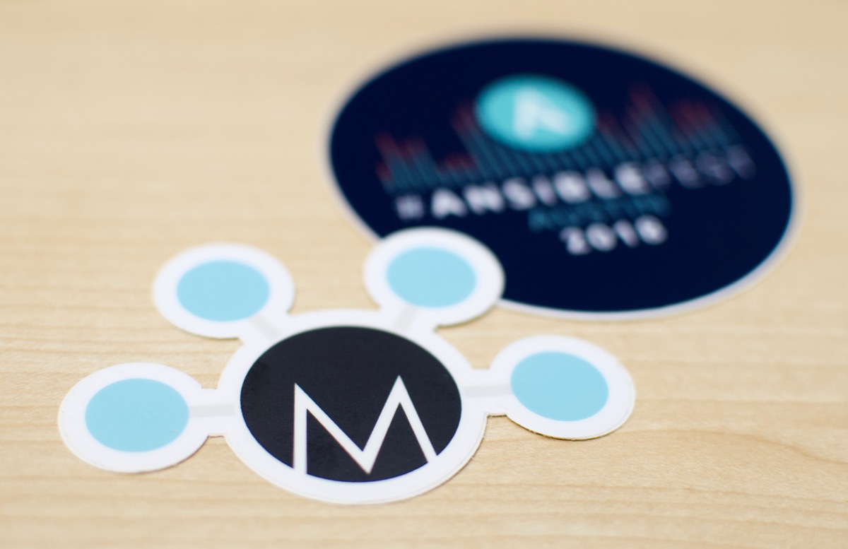 Molecule sticker in front of AnsibleFest 2018 Sticker