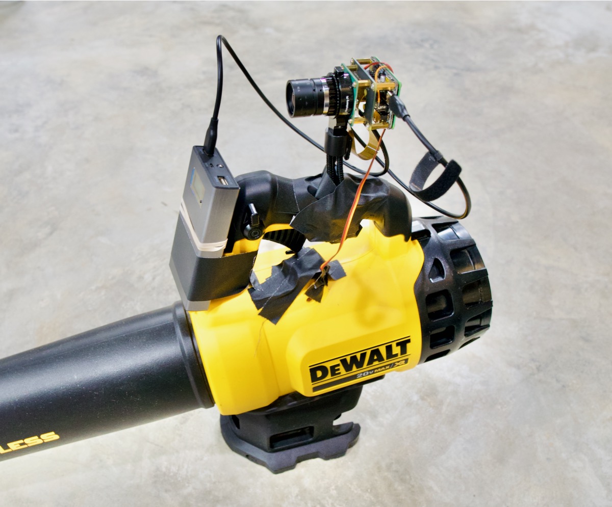 Leaf blower with Raspberry Pi on top for AI ML Machine Vision blasting
