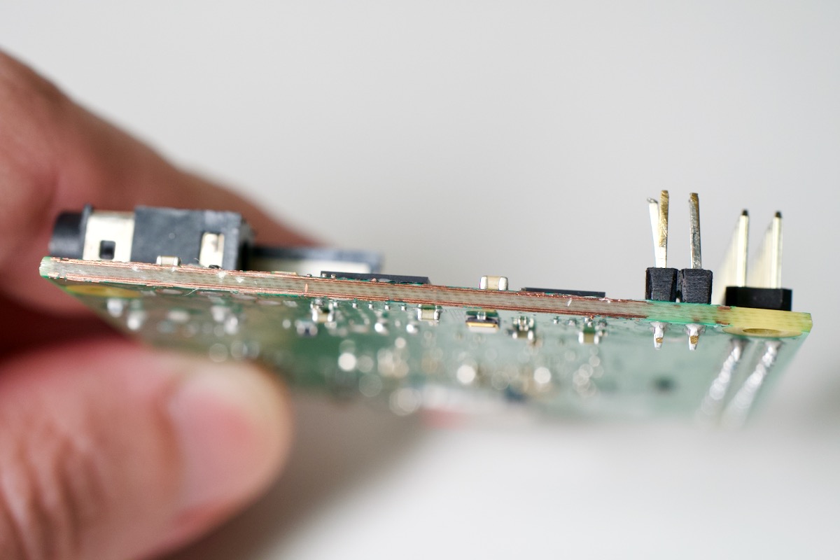 Edge of Raspberry Pi 4 model B PCB cleaned up after cut