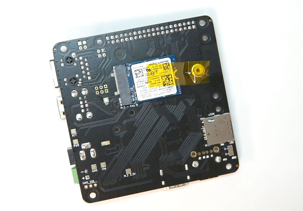 Kapton tape holding down WD 30mm 2030 M.2 NVMe SSD on TOFU board