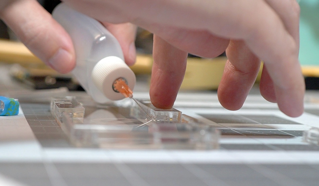 Weldon 4 Acrylic glue placing two parts together on Null 2 case