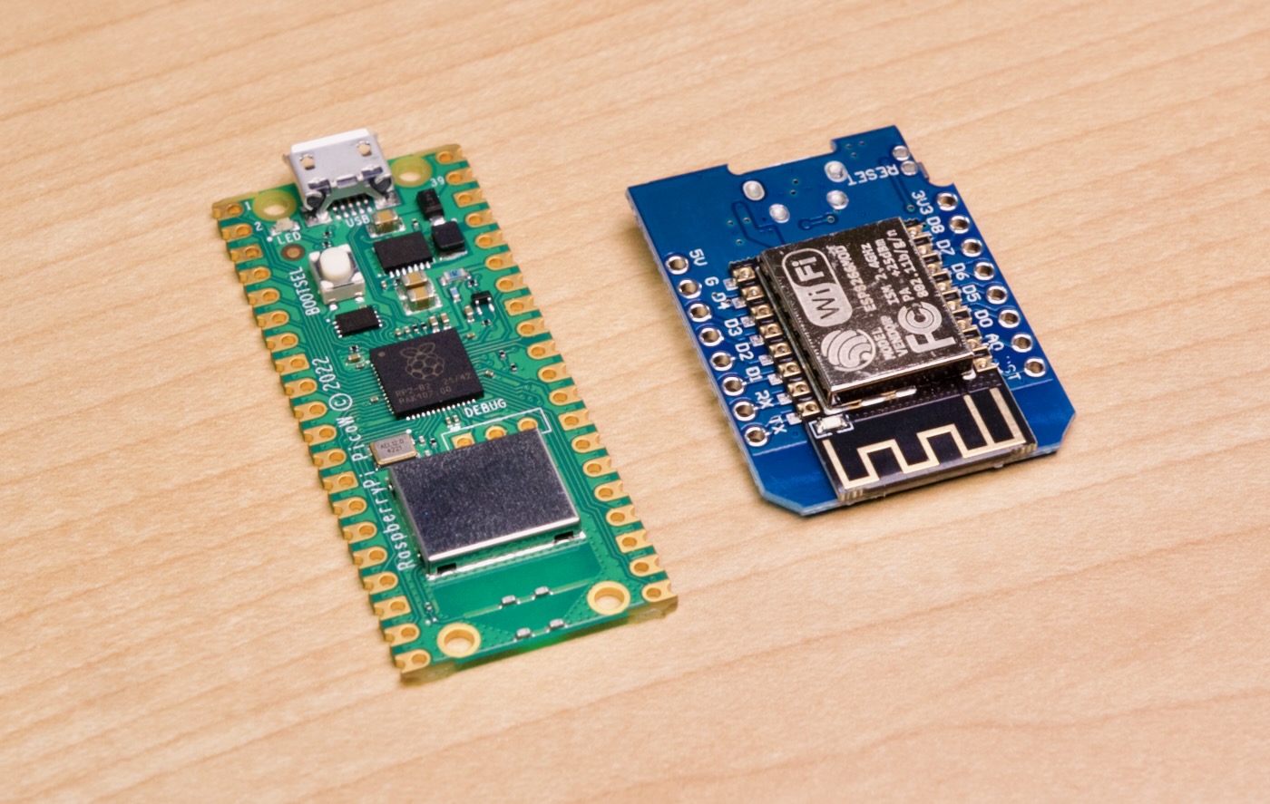 Raspberry Pi Pico W next to ESP8266-based D1 mini
