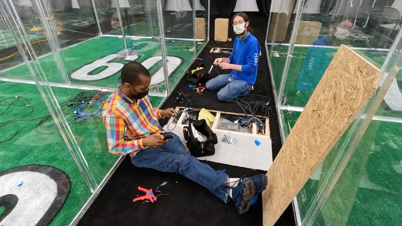 Julian and Q working on dupont crimps on the floor