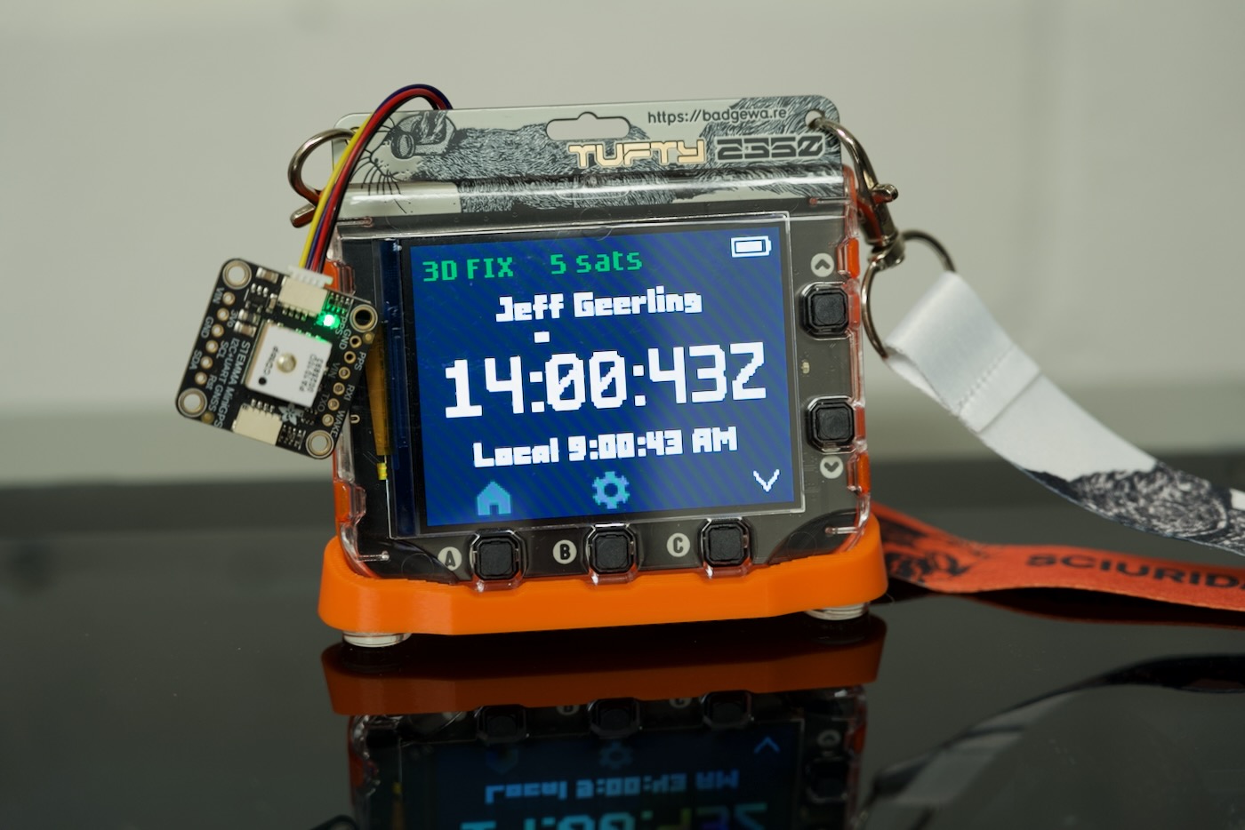 Pimoroni's Tufty 2350 running my GPS Time App with a GPS module
