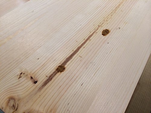 Fixing holes in top of wood with putty