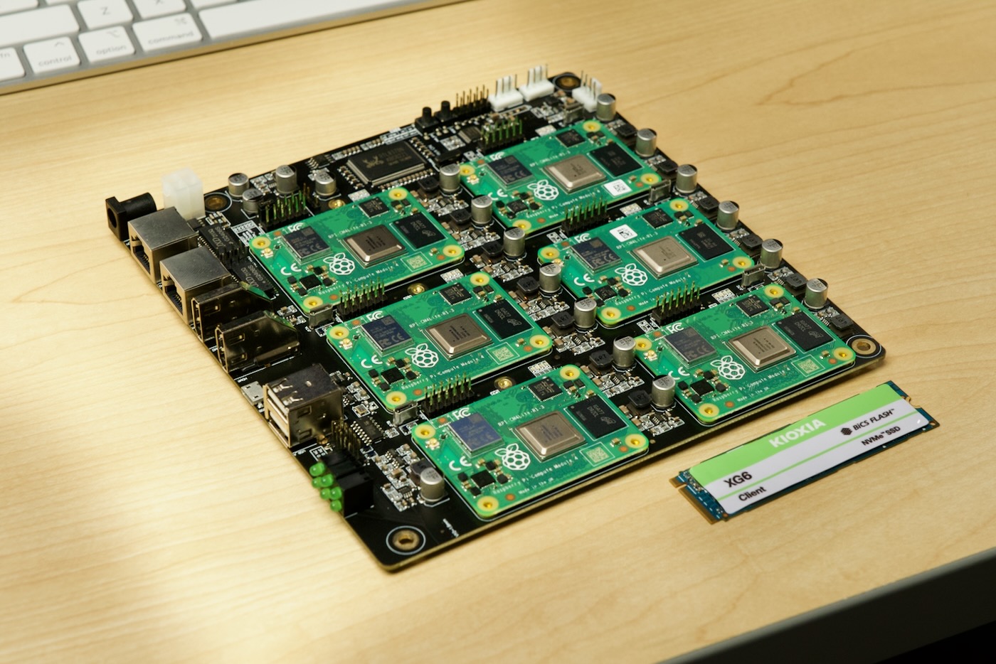 DeskPi Super6c with 6 Raspberry Pi Compute Module 4 and a Kioxia XG6 NVMe SSD