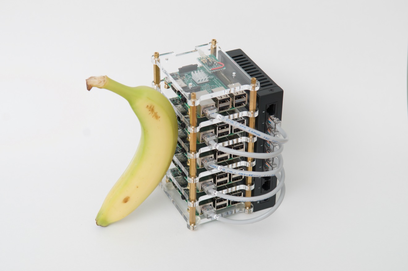Raspberry Pi Cluster next to a banana for scale