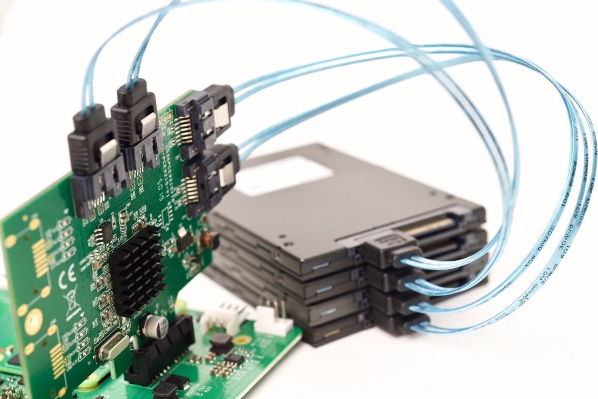 Raspberry Pi IO Crest SATA card plugged into 4 Kingston SSDs