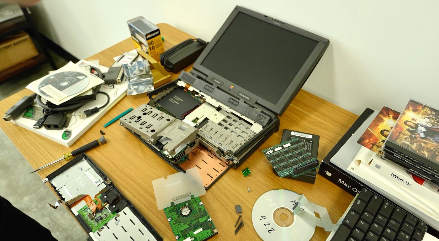 PowerBook 3400c disassembled on desk